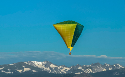 Photo Note Card: Hot Air Balloon Flying over the Rocky Mountains, taken from the Deck at our Home in Lafayette, Colorado.