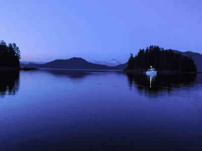 Photo Note Card: 
Pleasant Bay at dusk, with a boat and it's reflection, islands and mountains in the background, the mouth of Seymour Canal in the Inner Passage of southeast Alaska